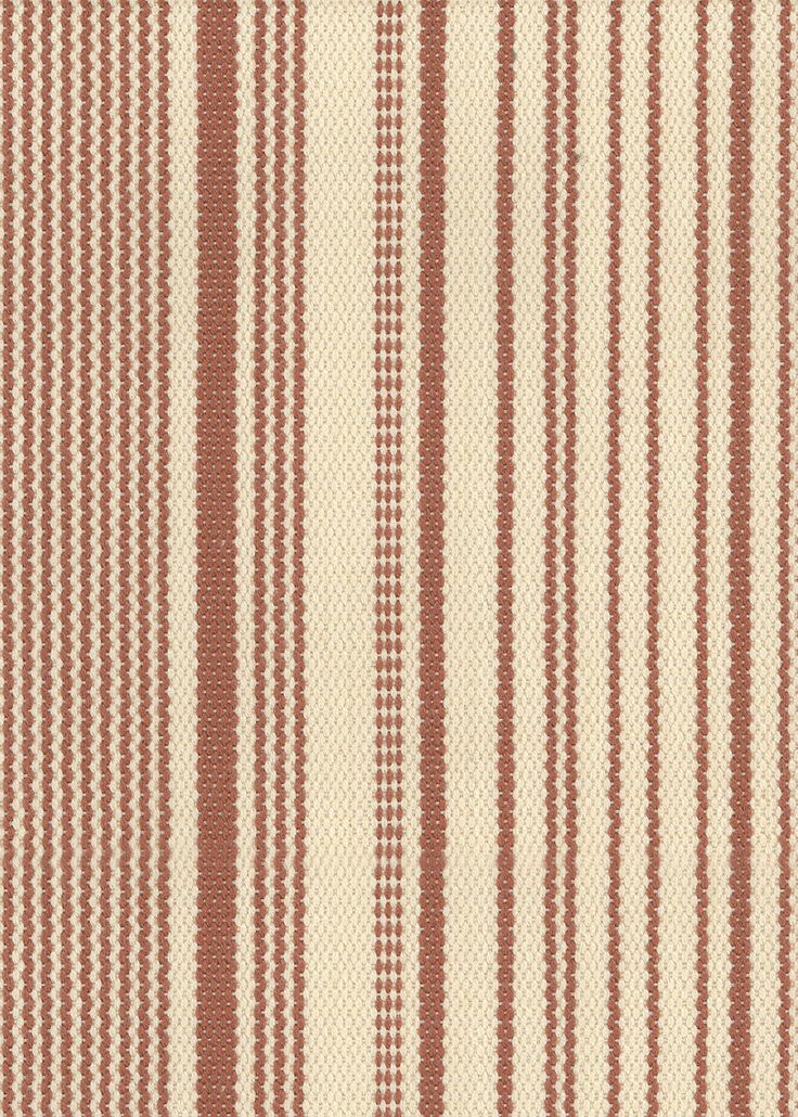 an orange and white striped upholstered fabric with small dots on the bottom half of it