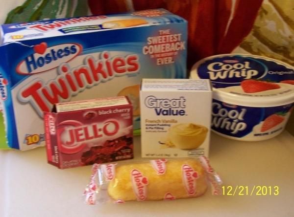 some food items are sitting on a counter top next to ice cream and yogurt