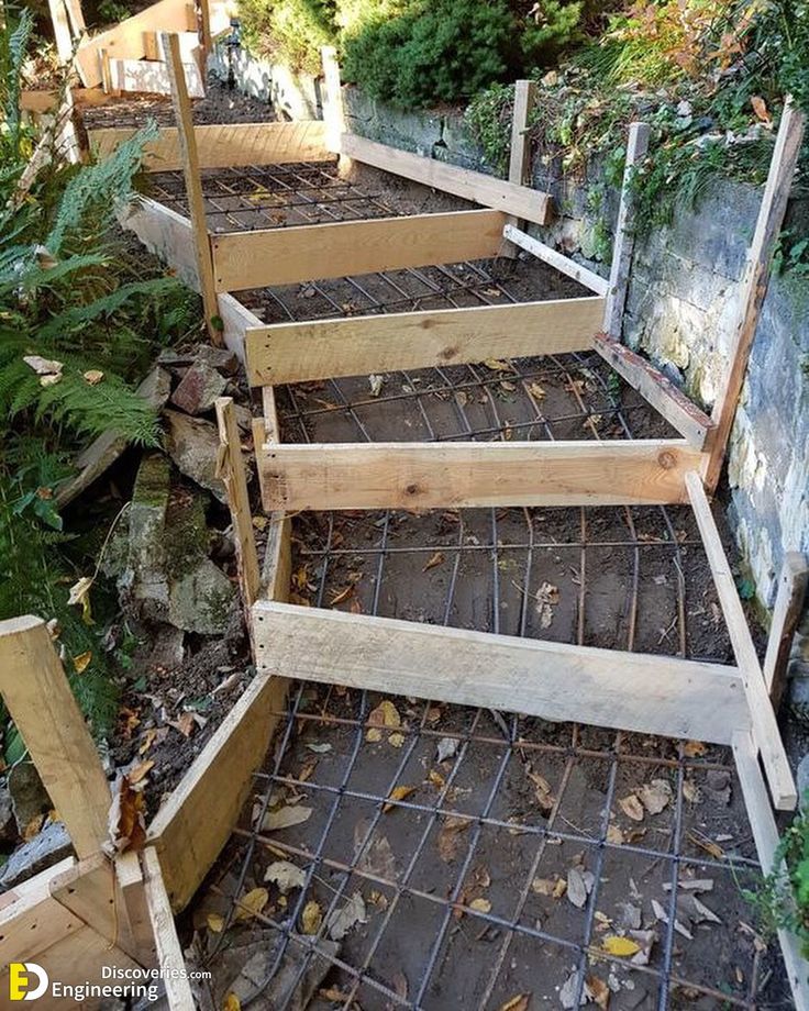 the steps are made out of wood and have metal grates on each one side