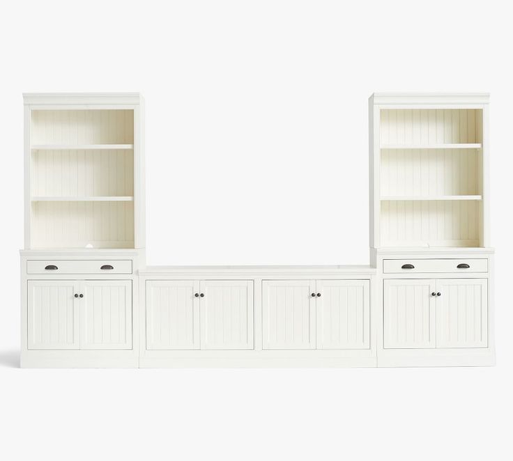 a white bookcase with drawers and cupboards on the bottom, against a white background