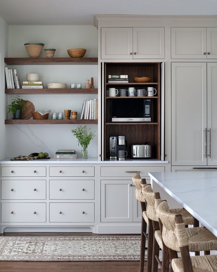 the kitchen is clean and ready to be used as a dining room or office space