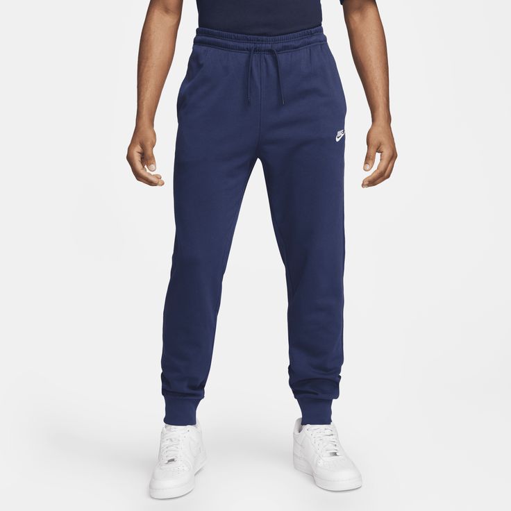 East to style and comfortable to wear, our Nike Club knit joggers are ready to become a versatile piece of your casual wardrobe. The relaxed fit is designed to give you a bit of room through the seat and thighs. The slight taper and ribbed ankle cuffs keep it clean around your sneakers. Pull them on with a tee or your favorite hoodie for casual, everyday wear. Nike Casual Cotton Sweatpants, Nike Cotton Joggers, Comfortable Nike Cotton Joggers, Comfortable Cotton Nike Joggers, Nike Cotton Joggers With Relaxed Fit, Comfortable Nike Cotton Sweatpants, Nike Comfortable Leisure Pants, Comfortable Nike Leisure Pants, Nike Cotton Joggers With Comfort Waistband