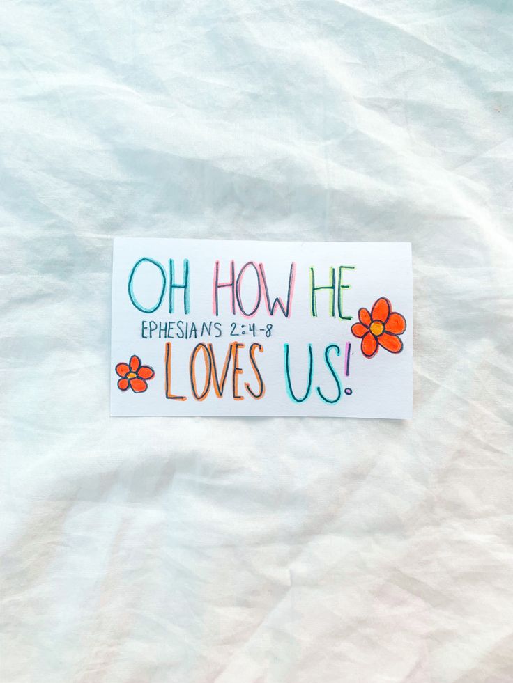 a sticker with the words oh how he loves us written in multicolored letters