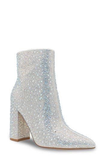 Sparkling crystals add undeniable glamour to a pointy-toe bootie lifted by a bold block heel. 3 1/4" heel 6" shaft Side zip closure Cushioned footbed Synthetic upper, lining and sole Imported Sparkling High Heel Evening Boots, Party Heeled Boots With 4-inch Block Heel, Evening Boots With 4-inch Block Heel, Glamorous Embellished Heeled Boots With Pointed Toe, Sparkling Heels For Formal Fall Events, Sparkling Ankle Boots For Evening, Party Boots With 4-inch Block Heel, Elegant Rhinestone Boots With Block Heel, Glamorous Sparkling Ankle-high Boots