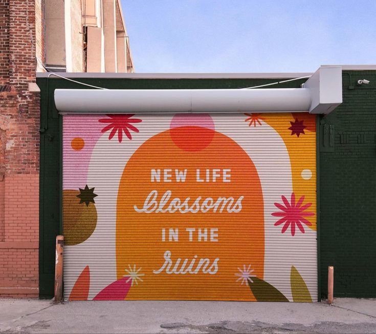 a mural on the side of a building that says new life lessons in the sun