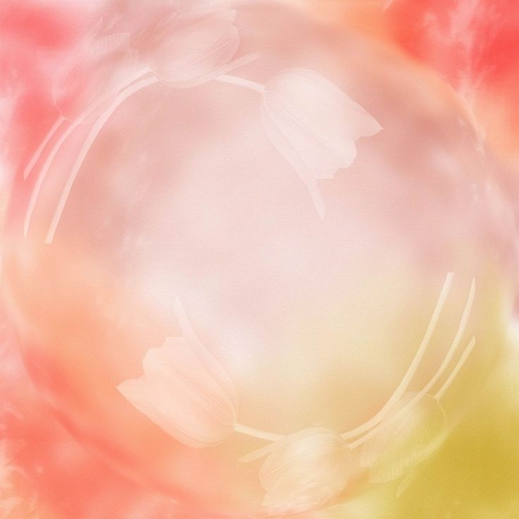 a blurry image of flowers in the center of a circular object with pink, yellow and red colors