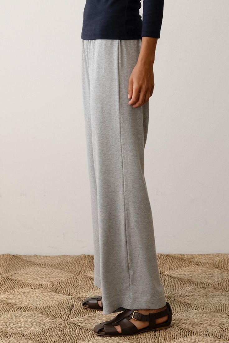 The Baby Rib Scallop Pant is crafted from our dreamiest, butter-soft fabric—it's like a hug from a stick of butter (you truly have to feel it to believe it). Designed with a comfy elastic waistband, cropped fit, and scalloped edges at the hem. These pants blend cozy comfort with effortless style. Made in Los Angeles Elastic Waistband Bottoms For Daywear, Soft Cotton Sleep Bottoms, Relaxed Fit Solid Bottoms For Daywear, Full-length Loungewear Bottoms With Elastic Waistband, Soft Texture Bottoms For Spring Loungewear, Full Length Loungewear Bottoms With Elastic Waistband, Soft Texture Loungewear Bottoms For Spring, Full Length Bottoms With Elastic Waistband For Daywear, Bottoms With Elastic Waistband For Daywear