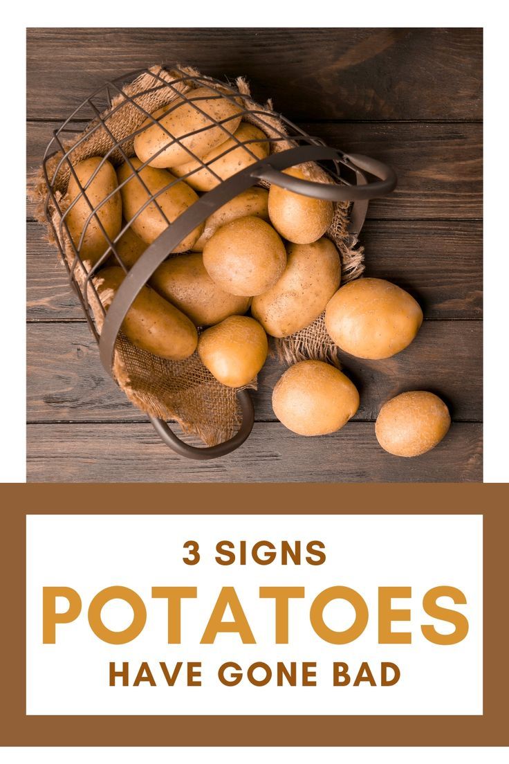 A flipped basket laying on its side, with fresh potatoes in it and some scattered on a wooden background Prevent Food Waste, A Potato, Food Waste, To Tell, Potato, To Look, Key, Signs