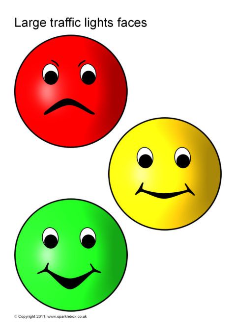 three smiley faces in different colors with the words large traffic lights faces on each one