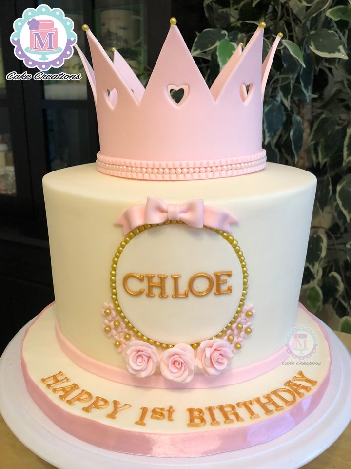 a birthday cake with a crown on top