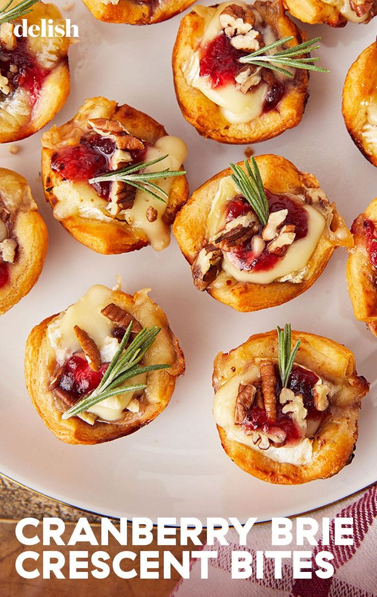 cranberry brie crescent bites on a white plate