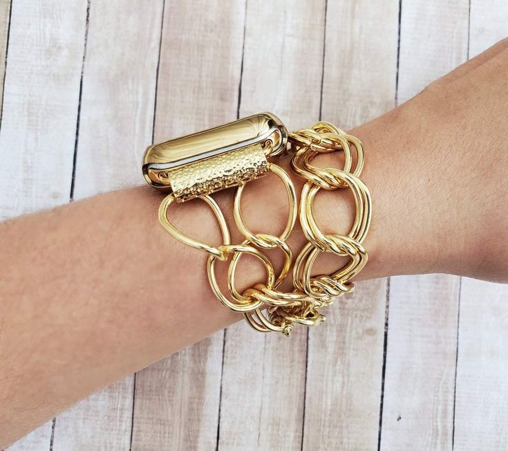 Super elegant and exquisite handmade chain link apple watch bracelet. Made to create a unique look to your favorite watch and make you feel special during all day and even night. The bracelet is made from gold plated brass chain links and decorated with gold plated details , chain extension and lobster claw clasp. This bracelet is designed to fit wrist sizes from 5.5" to 7.5" PLEASE, MEASURE YOUR WRIST BEFORE ORDERING THE BAND. HOW TO MEASURE: Using a fabric tape measure, encircle the part of yo Adjustable Gold Metal Apple Watch Band, Adjustable Metal Gold Apple Watch Band, Gold Metal Apple Watch Band With Extender, Gold Metal Chain Link Watch Bands, Adjustable Gold Watch Band With Solid Link Construction, Gold Chain Link Bracelet Strap Watch Bands, Adjustable Gold Chain Watch Bands, Gold Chain Link Apple Watch Band With Bracelet Strap, Gold Chain Link Apple Watch Band