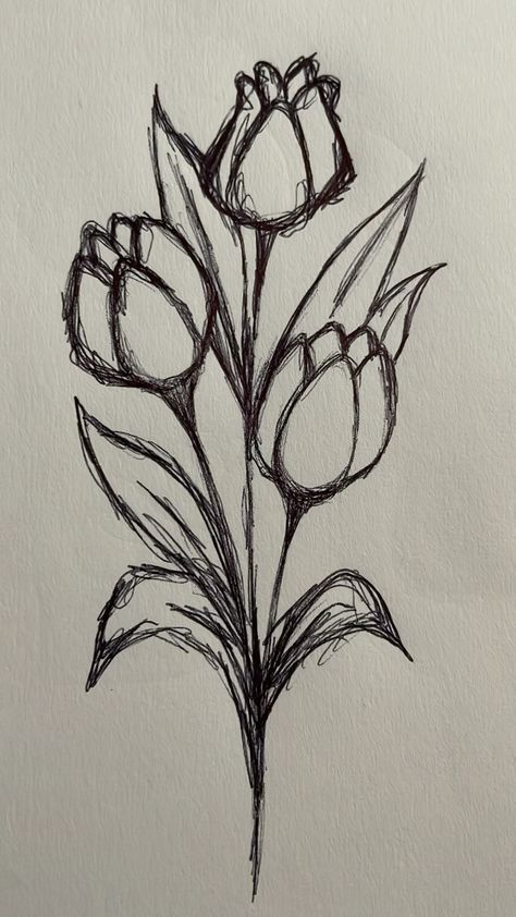 a drawing of some flowers on a piece of paper that is drawn with black ink