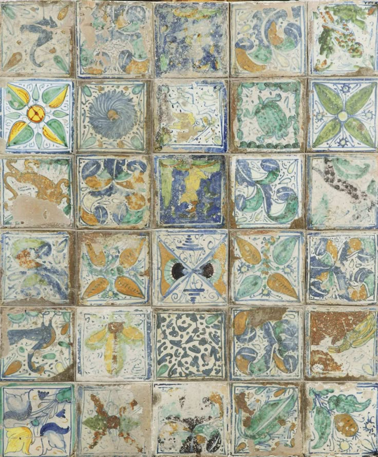 an artistic tile design in blue, yellow and green