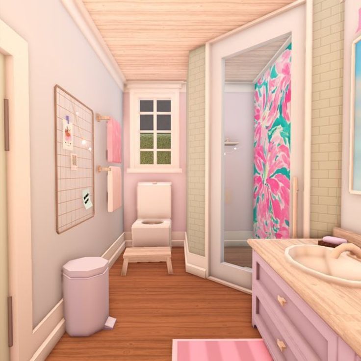 the bathroom is decorated in pastel pink and green colors, with wood flooring