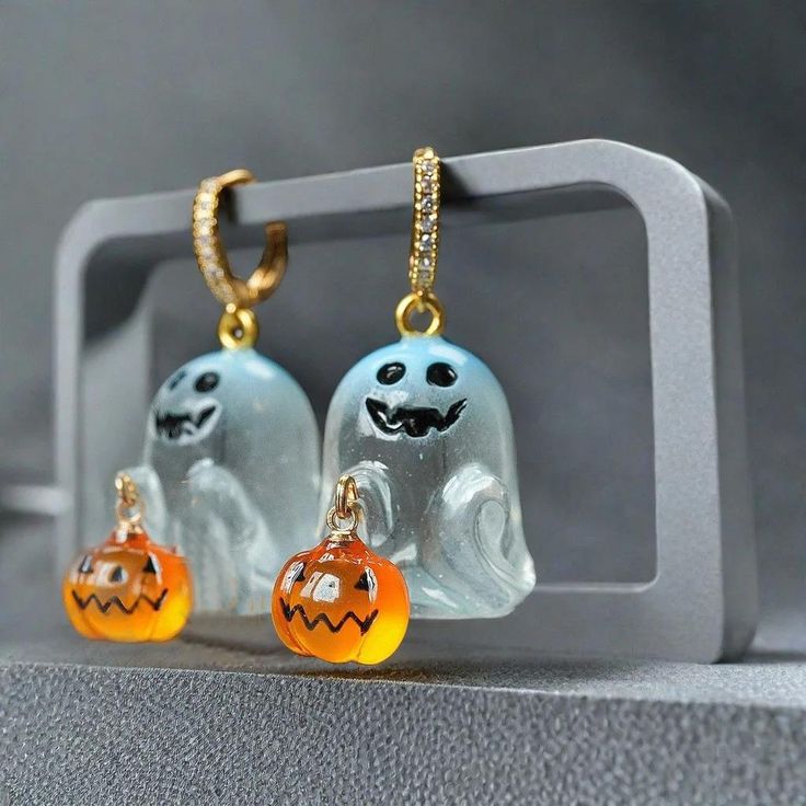 Looking for a cute and spooky accessory for Halloween? Look no further than our Ghost Halloween Earrings. These adorable earrings are the perfect way to show off your holiday spirit. Made with hypoallergenic materials, they are safe for even the most sensitive skin. Whether you're trick-or-treating or attending a costume party, these earrings are sure to be a hit. Labu Halloween, Ghost Earrings, Pumpkin Earrings, Ghost Pumpkin, Halloween Earrings, Halloween Jewelry, Halloween Ghost, Girls Jewelry, Stainless Steel Earrings