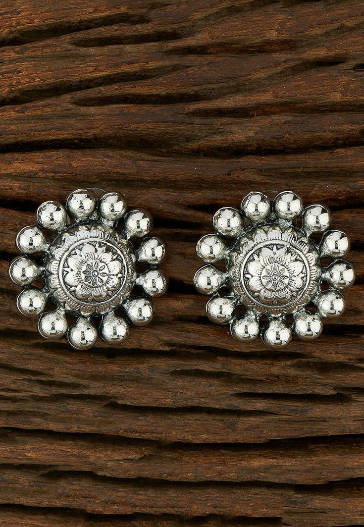 Oxidised Earrings  Alloy Based Earrings in Silver, This Oxidised Pair is Enhanced with Beads, Take the centre stage with this Traditional Ethnic Jewellery, handmade with intricate Indian craftsmanship and exclusively choosen from a curated collection of exquiste pieces, brought to you by Fabula. The earrings can be teamed up with festive wear and also with casual wear for a complete look.  About The Product: Oxidised Earrings Length- 1 and Earring Widths- 1 inches, Designed for traditional a look this Earrng is intricately handcrafted by local artisans. Team this up with your Saree, Lengha, Salwar Kameez, jacket, or skirt etc to create a look that exudes royalty and grace.  Dimensions:  Length- 1 and Earring Widths- 1 inches   Key Benefits  Light in weight  Wear in any Occasion    Legal Di Traditional Silver Bead Drop Earrings, Traditional Round Bead Earrings For Festivals, Traditional Silver Cluster Earrings As Gift, Festive Temple Jewelry Earrings With Round Beads, Traditional Silver Drop Flower Earrings, Festive Silver Beaded Earrings, Traditional Silver Beaded Earrings For Pierced Ears, Traditional Silver Beaded Drop Earrings, Traditional Round Clip-on Earrings