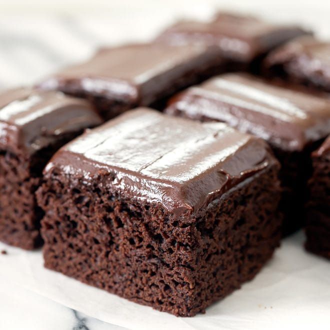 several pieces of chocolate cake on a plate