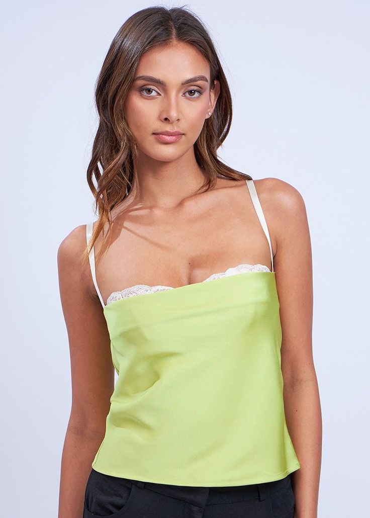 Green crop top with built-in cream bralette 100% Polyester Size and Fit: Model height 5'6" wearing size Small Flirty Cropped Top With Built-in Bra, Green Camisole Crop Top With Built-in Bra, Flirty Crop Top With Built-in Bra For Spring, Chic Crop Top Camisole With Built-in Bra, Brunch Camisole With Built-in Bra, Green Crop Top With Built-in Bra For Summer, Chic Camisole With Built-in Bra For Brunch, Spring Crop Top With Built-in Bra For Night Out, Feminine Spring Crop Top With Built-in Bra