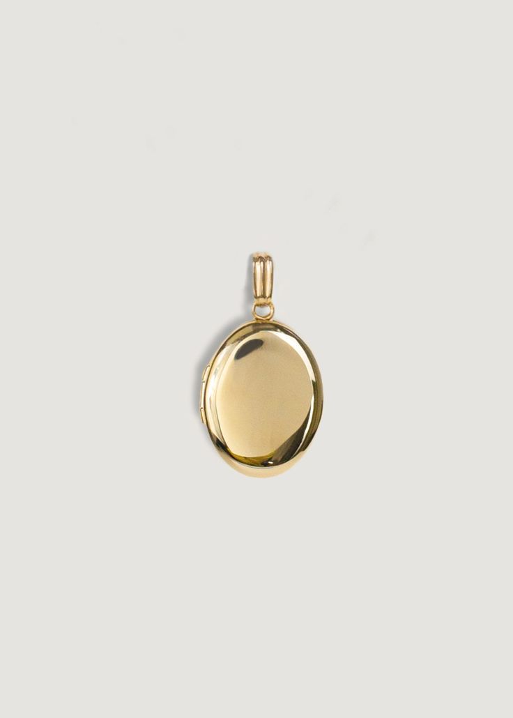 Maison Oval Locket - Engraving Luxury Timeless Locket Necklace With Round Pendant, Luxury Timeless Round Pendant Locket Necklace, Luxury Oval Jewelry For Keepsake, Timeless Engraved Oval Locket Necklace, Timeless Oval Engraved Locket Necklace, Gold Oval Locket, Timeless Oval Locket Jewelry, Timeless Oval Locket Necklace For Gift, Timeless Gold Oval Locket Necklace