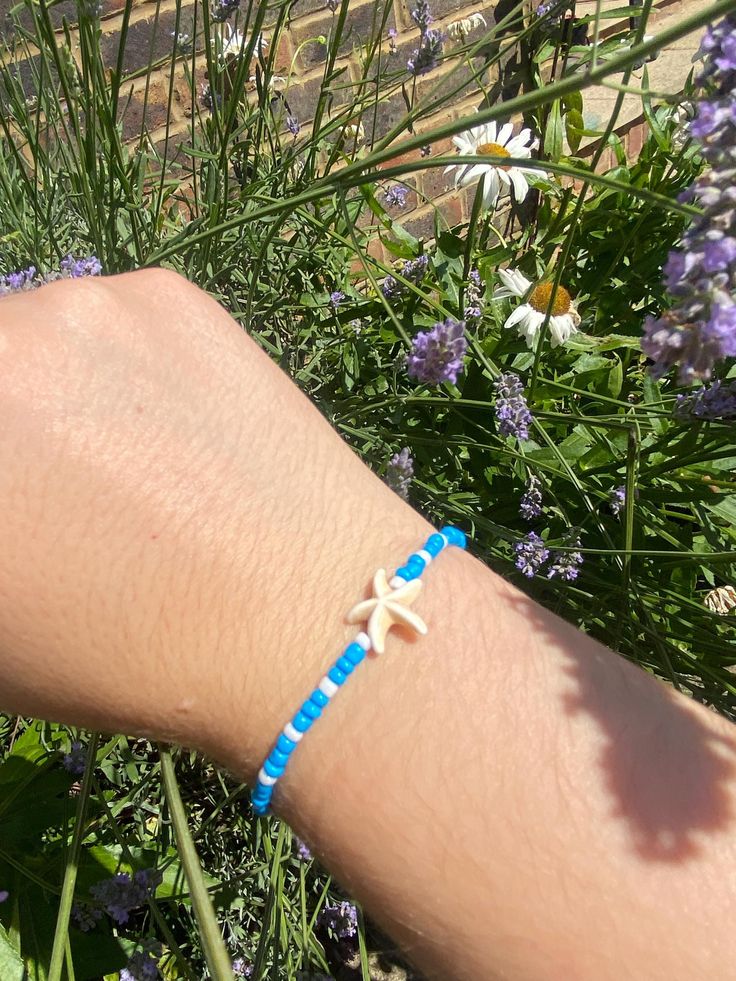 Handmade by me,  white and blue beach bracelet, delicate and beautiful 💙🤍. can be sold as is or customised, by colours, beads, charms or letters, message me if required! :) Handmade Blue Summer Jewelry, Handmade Summer Blue Jewelry, Dainty Tiny Beads Bracelets For Beach, Dainty Blue Friendship Bracelets With Colorful Beads, Blue Summer Style Jewelry Gift, Summer Style Blue Jewelry Gift, Blue Starfish Bracelets For Summer, Dainty Friendship Bracelets For Summer Beach, Handmade Dainty Friendship Bracelets For Beach