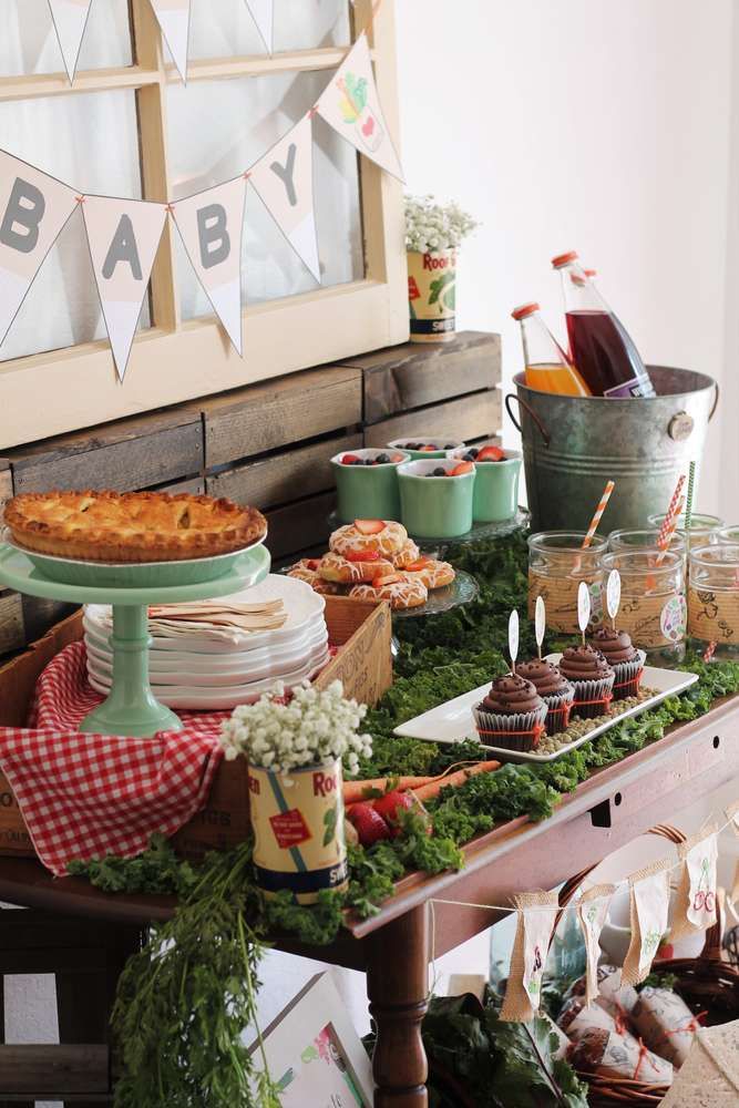 a table filled with lots of food and desserts