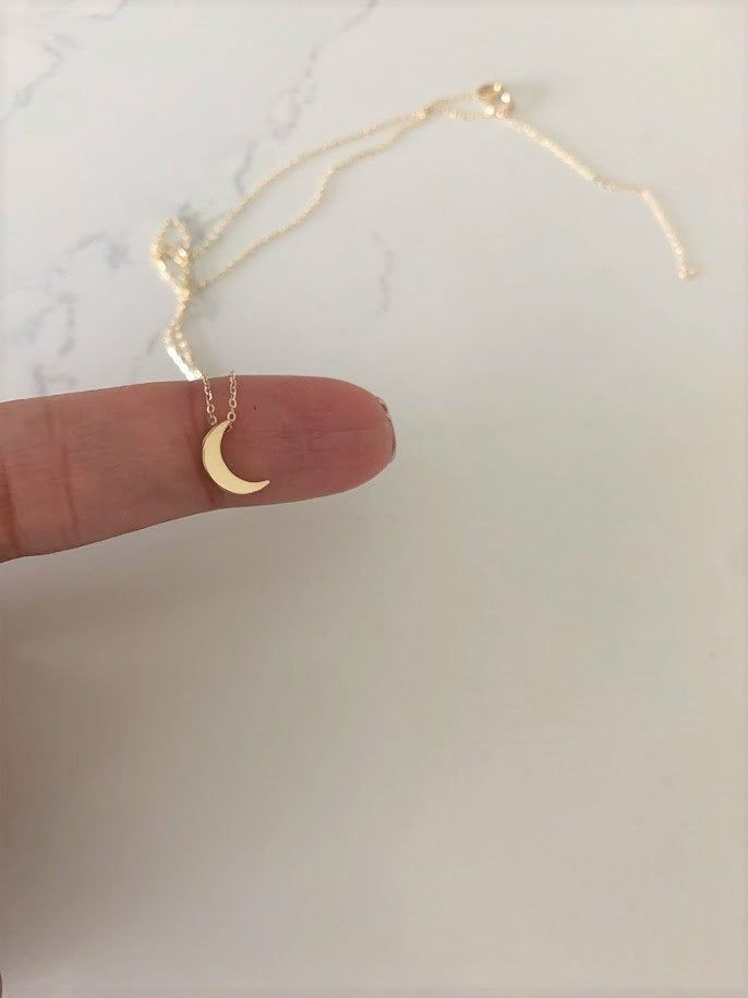 "14k Solid Gold Moon Necklace, Bold Moon 14k Gold, Hollow Moon, Crescent Moon, Dainty Necklace, Layering Necklace, Gold Moon Necklace ------------------------------------------------- ♦ --------------------------------------------------- The Moon Necklace is a beautiful, affordable dainty 14K Solid Gold piece of jewelry that is great for everyday wear. It comes available just in yellow gold. This necklace can be used in combination any of our other necklaces for a layering effect. A great idea f Fine Jewelry Moon Phase Necklace In 14k Gold, 14k Gold Moon Phase Necklace, Fine Jewelry 14k Gold Moon Phase Necklace, Delicate Yellow Gold Necklace With Moon Phase, Delicate Yellow Gold Moon Phase Necklace, Delicate 14k Gold Necklaces With Moon Charm, Sterling Silver Moon Necklace Fine Jewelry, Gold Moon Phase Necklace In Fine Jewelry, Gold Moon Necklace Fine Jewelry