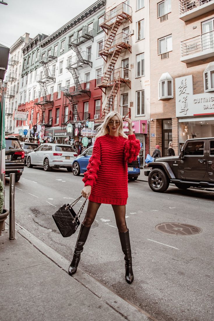 Little Italy NYC wearing Knit Bubble Sleeve Sweater Dress, fall outfit ideas, black to the knee boots, red dress. Knit Red Dress, Red Knit Dress Outfit Winter, Red Dress Boots Outfit, Red Jumper Dress Outfit, Red Knitted Dress, Red Dress With Black Boots, Red Sweater Dress With Boots, Red Dress Fall Outfit, Red Knit Dress Outfit