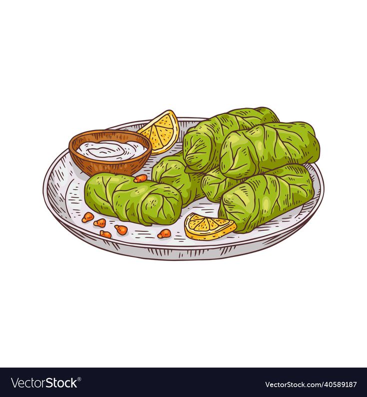 stuffed cabbages on a plate with dipping sauce