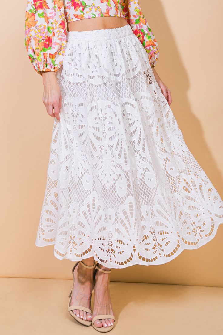 Indulge in the blissful elegance of our WOVEN LACE MIDI SKIRT, featuring a seamless back zipper closure.Details:Self : 100% PolyesterLining : 100% PolyesterSize & Fit- Model is 5`10" And Wearing Size Small- Measurements Taken From Size Small- Approx. Length: 35.5" White Elegant Maxi Skirt For Brunch, Elegant White Maxi Skirt For Brunch, White Skirted Bottoms With Lace Trim, Feminine Fitted White Maxi Skirt, Elegant White Lace Maxi Skirt, White Fitted Maxi Skirt For Brunch, White Feminine Tiered Maxi Skirt, White Lace Maxi Skirt For Spring, Fitted White Skirt With Lace Trim