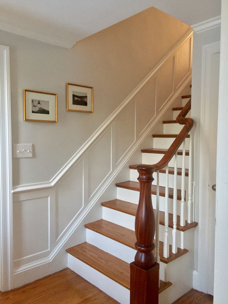 there is a wooden stair case in this house