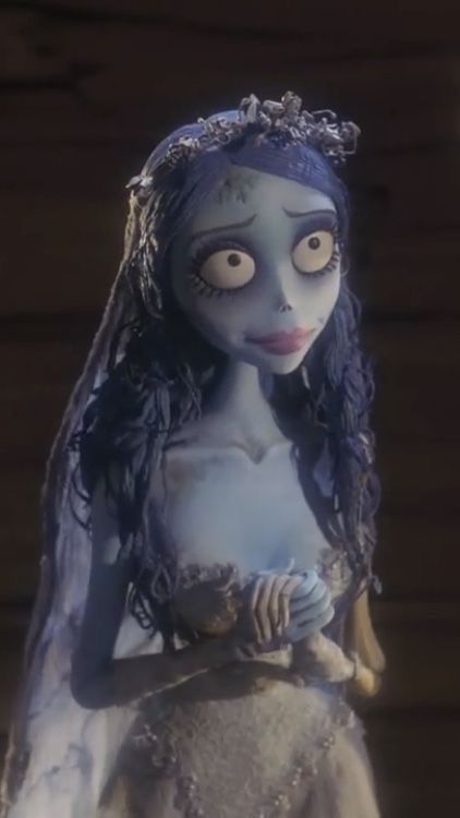 a corpse bride doll is posed for a photo