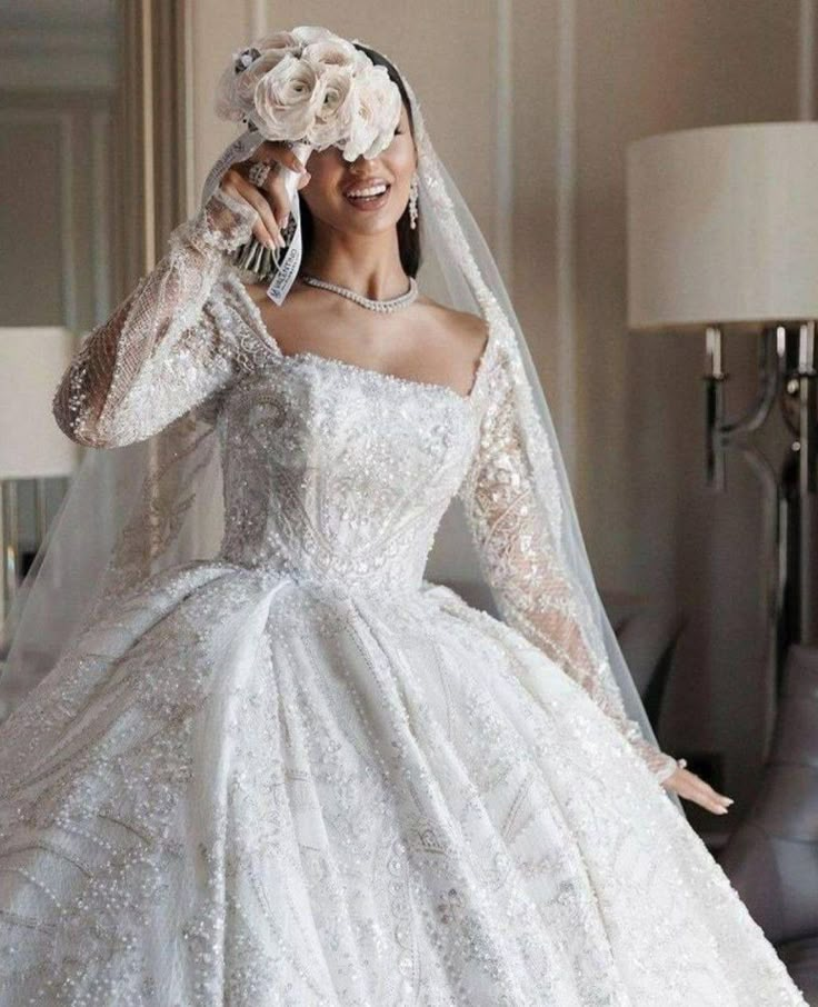 a woman in a wedding dress is talking on the phone