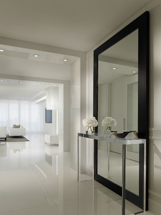 an image of a room with white walls and floors