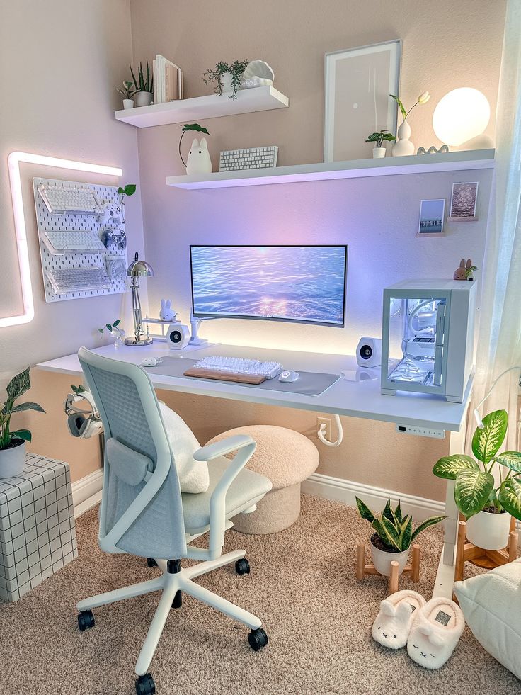 a computer desk with a monitor and keyboard on it