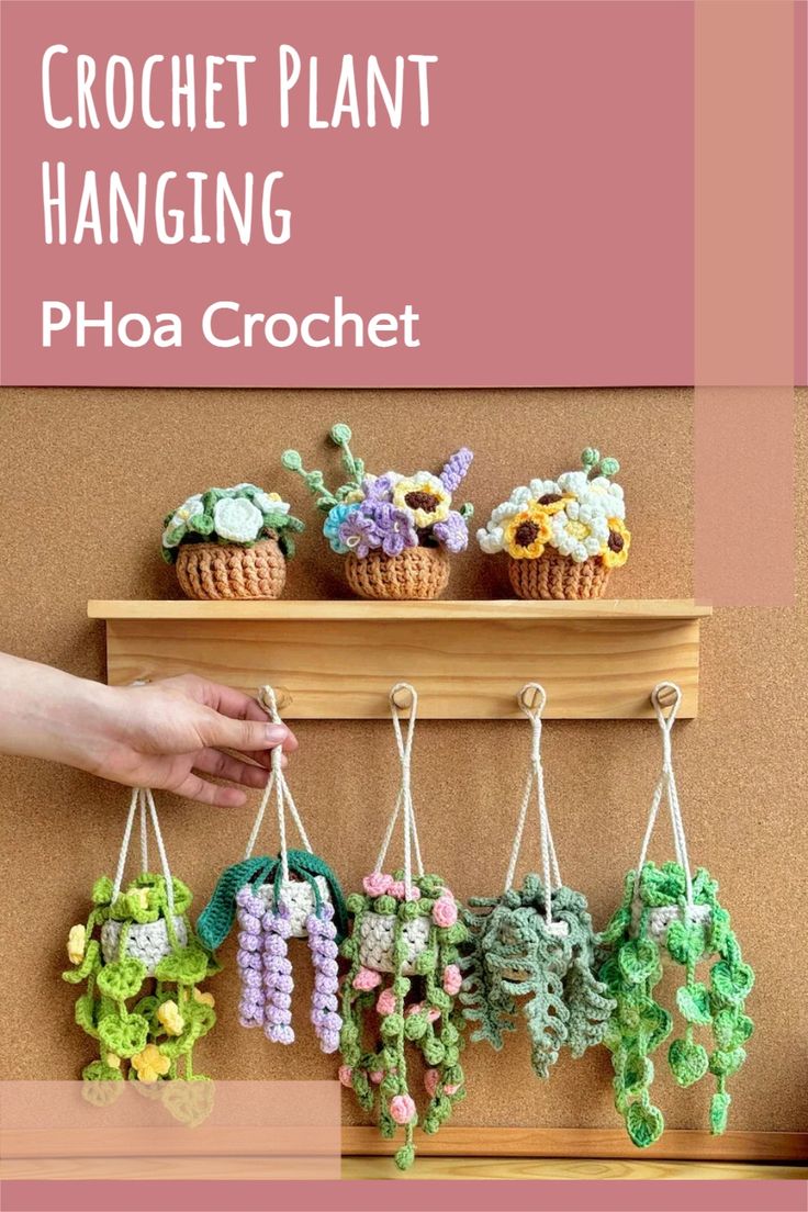 crochet plant hanging on a shelf with flowers and plants attached to the hooks