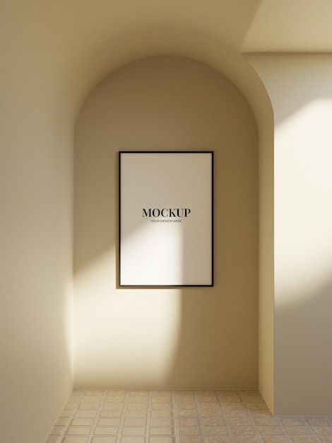 an empty room with a framed mockup on the wall next to a tiled floor