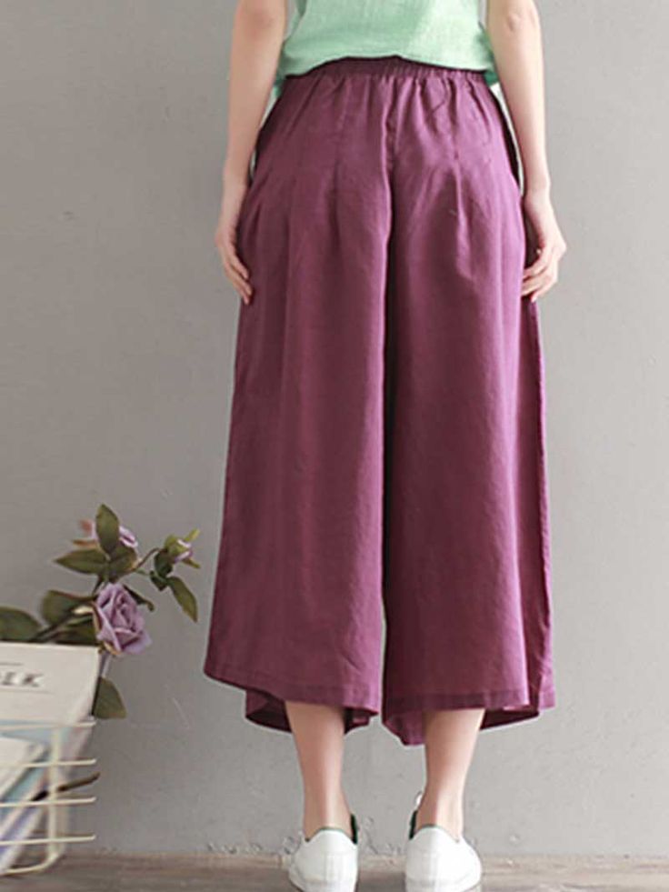 Looking for summer-ready pants that will keep you cool and comfortable all day long? The Puppy Love Cotton linen wide-leg Trousers are perfect for those hot summer days. Made from a hemp blend. these trousers are lightweight and breathable. making them perfect for warmer weather. They also feature double side pockets. a cropped pant length. and a wide-leg silhouette for a relaxed look. Plus. they come in four trendy colors: purple. grey. dark khaki. and army green. So whether you're headed to the beach or just running errands around town. the Puppy Love Cotton linen wide-leg Trousers are a must-have for your closet. Size Details ( M / L ) Waist: 68-94cm / 26.77-37.0inch Length: 71cm / 27.9inch Summer Vacation Wide-leg Harem Pants, Spring Summer Harem Pants With Pockets, Spring/summer Harem Pants With Pockets, Spring Vacation Wide-leg Harem Pants, Baggy Harem Pants For Beach And Spring, Wide Leg Harem Pants For Spring Vacation, Spring Casual Wide Leg Pants, Casual Baggy Wide Leg Pants For Spring, Non-stretch Wide Leg Pants With Pockets For Vacation