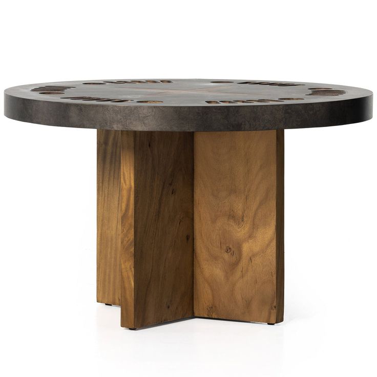 a round wooden table with metal accents on the top and bottom, against a white background