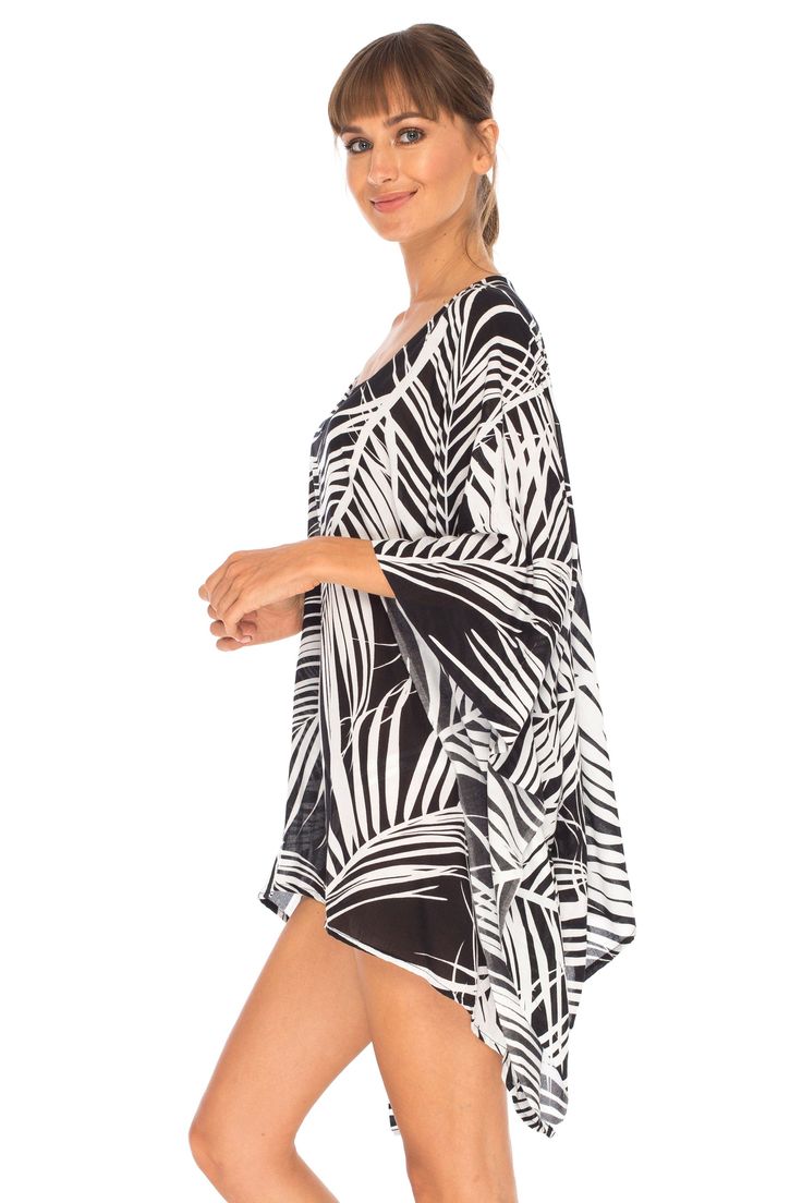 Having a stylish beach cover up is a must! The beautifully printed tunic beach coverup creates a vibrant look. Easy to pull on and easy to pack. Making clothes for the traveling woman. Boho design Lightweight beach dress Semi-Sheer Hand wash in cold water, hang to dry Tropical Long Sleeve Cover-up For Beach Season, Printed Beach Cover-up With Kimono Sleeves, Flowy Cover-up For Resort Season Vacation, Printed Flowy Kaftan For Beach Cover-up, Flowy Black Summer Cover-up, Bold Print Summer Beach Dresses, Summer Beachwear Tunic For Beach Cover-up, Casual Tunic For Beach Cover-up During Beach Season, Oversized Black Beachwear Cover-up