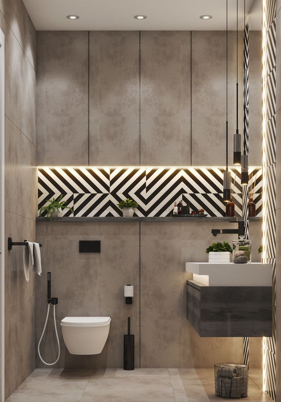 a modern bathroom with a toilet, sink and shower head mounted to the side of the wall