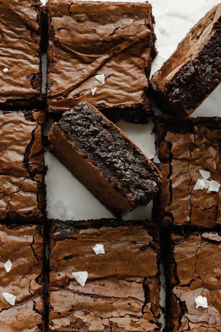 chocolate brownies cut into squares on top of each other