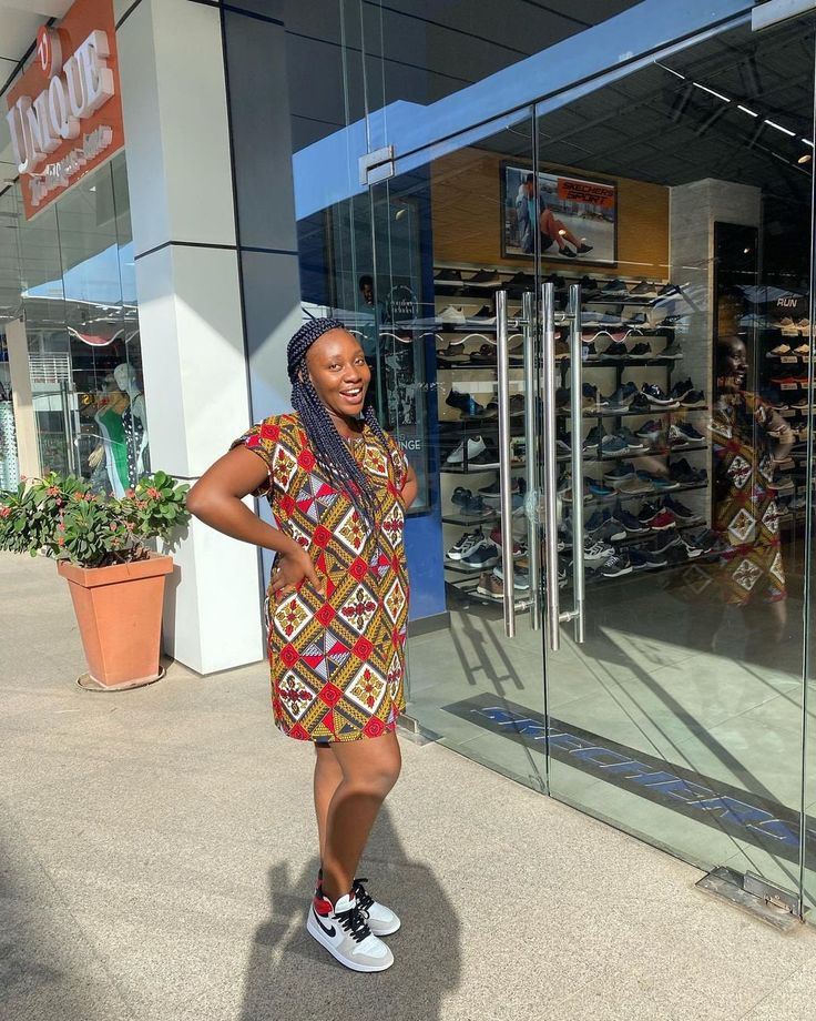 This piece is loose which makes wearing easy and comfortable. It has an opening on the neckline Casual Tunic Mini Dress For Day Out, Ankara Kimono Dress, Ankara Kimono, Ankara Short, Ankara Print, Kimono Dress, Bright Colours, Dress Clothes For Women, Short Dress