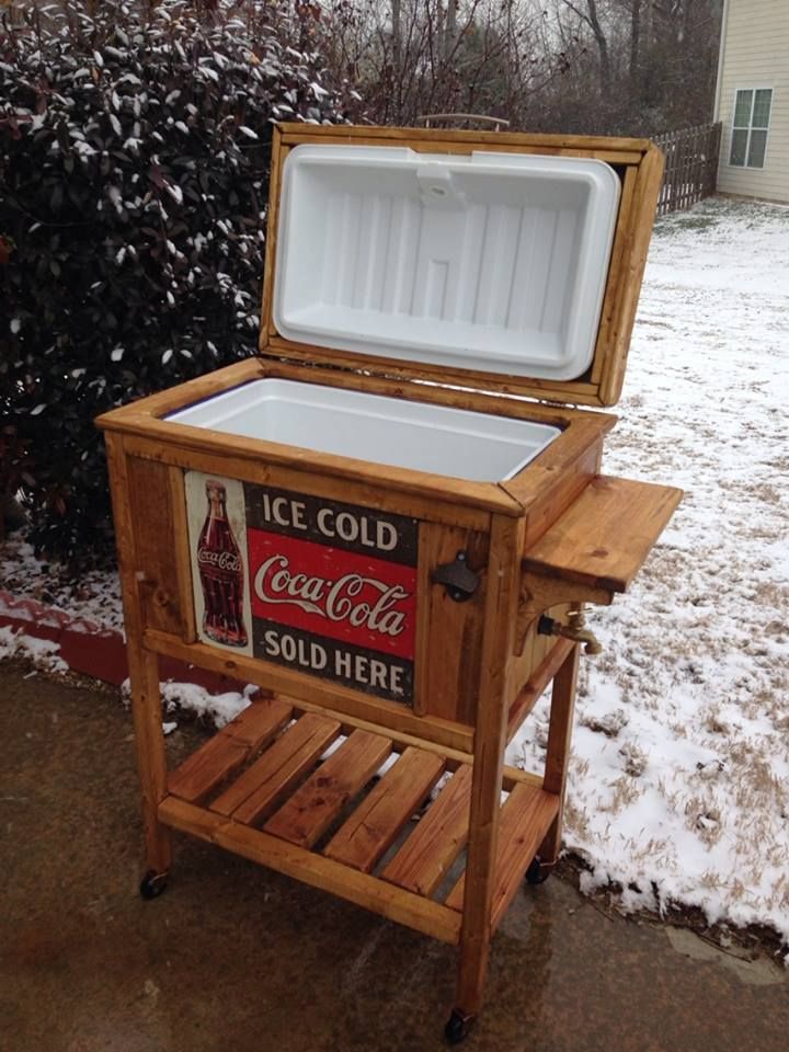 an ice chest on wheels in the snow