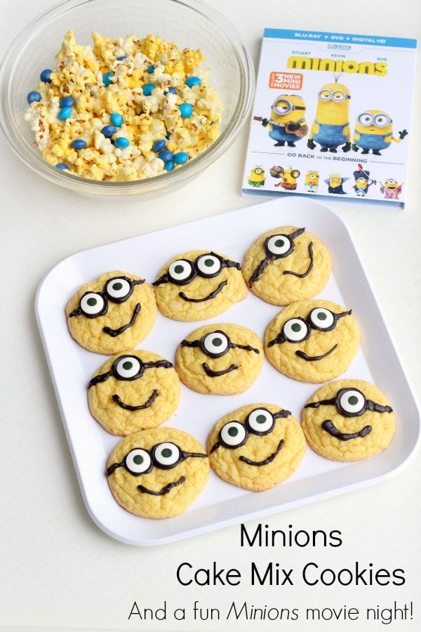 minion cake mix cookies are on a plate with cereal and a bowl of popcorn