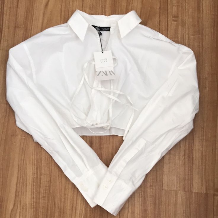 Zara Crop White Shirt Color: White Size: Large Condition: Brand New White Collared Crop Top For Summer, Elegant White Cropped Shirt For Spring, White Button-up Crop Top For Summer, White Cropped Collared Shirt For Spring, White Cropped Shirt With Collar For Spring, Chic White Cropped Shirt For Summer, White Cropped Shirt For Fall, White Long Sleeve Cropped Shirt For Day Out, Long Sleeve Cropped Shirt For Summer Day Out