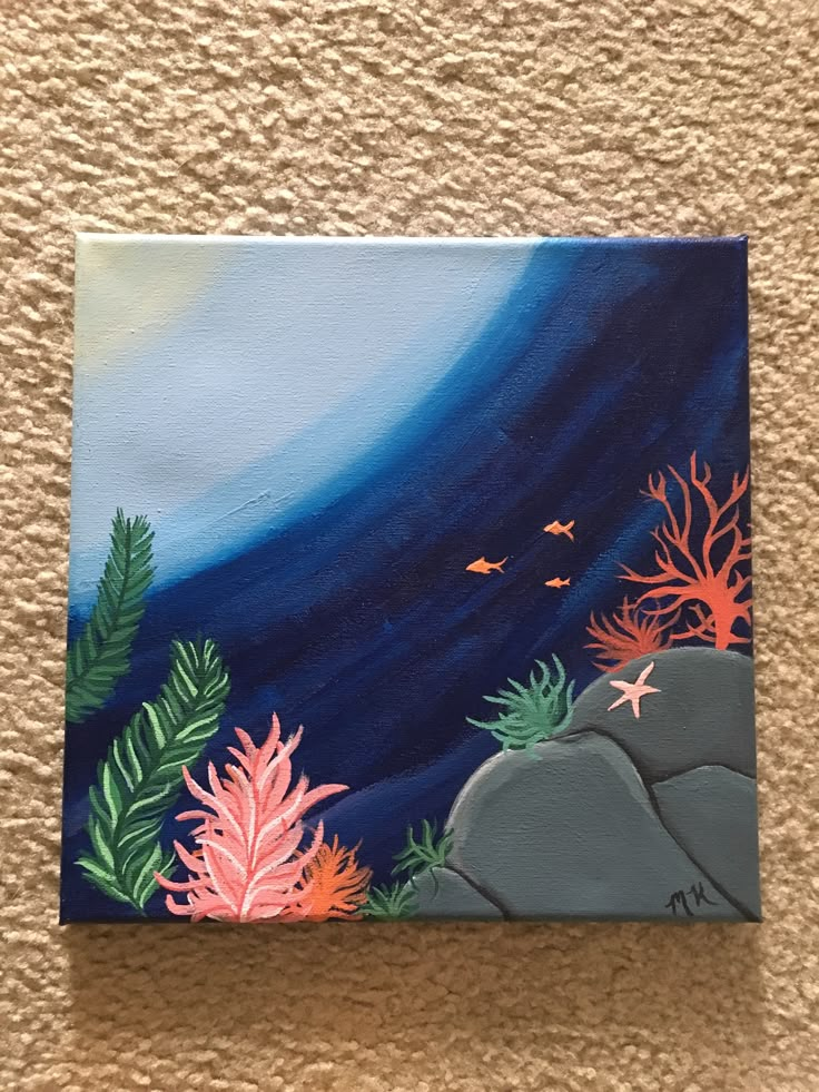 an acrylic painting of corals and seaweed in the ocean on a canvas