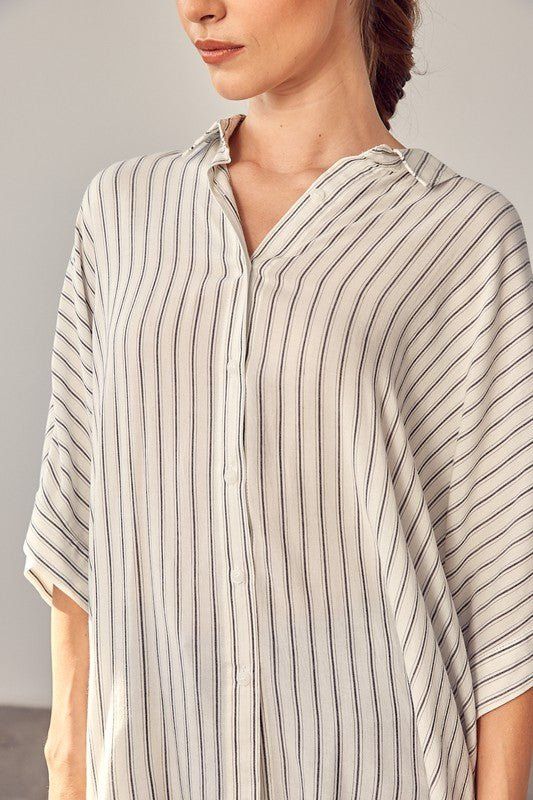 Introducing our Stripe Printed Kimono Sleeve Shirt, a stylish addition to your wardrobe. This shirt features a timeless stripe print that adds a touch of classic elegance to your look. The kimono sleeves provide a relaxed and comfortable fit, making it perfect for both casual and dressier occasions. With its versatile design, you can easily pair it with your favorite jeans or dress it up with a skirt for a chic ensemble. 100% rayon. Machine wash cold, gentle cycle, tumble dry low. Size Guide - M Striped Kimono, White Jumpsuit Dress, Printed Kimono, Sweatshirt Jean Jacket, Women Cargo Pants, Draped Blouse, Kimono Sleeves, Print Kimonos, Denim Accessories