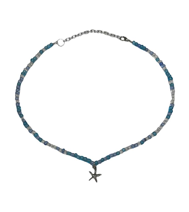 This beaded necklace is made of blue and clear seed beads and has a silver starfish charm This necklace was handmade by me  This necklace uses silver findings and has a long silver extender  Length: 15in    Length with extender: 17.5in Blue Beaded Necklaces With Starfish Charm For Beach, Blue Strand Necklace With Starfish Charm, Adjustable Blue Starfish Necklace, Adjustable Blue Necklace With Starfish Charm, Blue Star-shaped Beaded Necklace, Blue Beaded Necklaces With Starfish Charm, Adjustable Blue Star-shaped Beaded Necklace, Adjustable Blue Beaded Star Necklaces, Blue Adjustable Star-shaped Beaded Necklaces