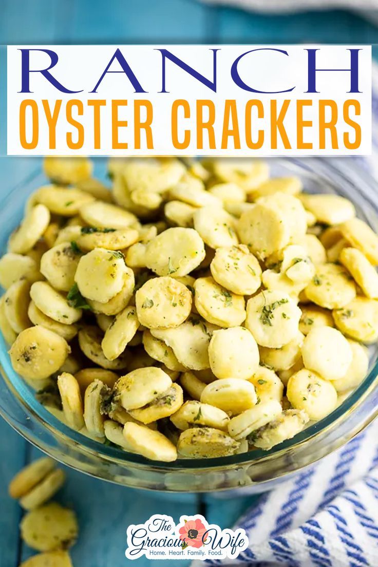 ranch oyster crackers in a glass bowl on a blue and white towel with text overlay